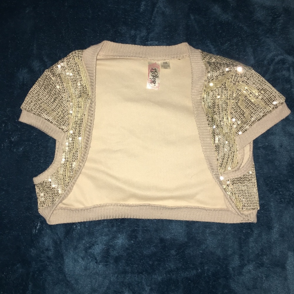 Gold sequin shoulder cover